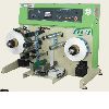 REVERSIBLE RE-REELING MACHINE 